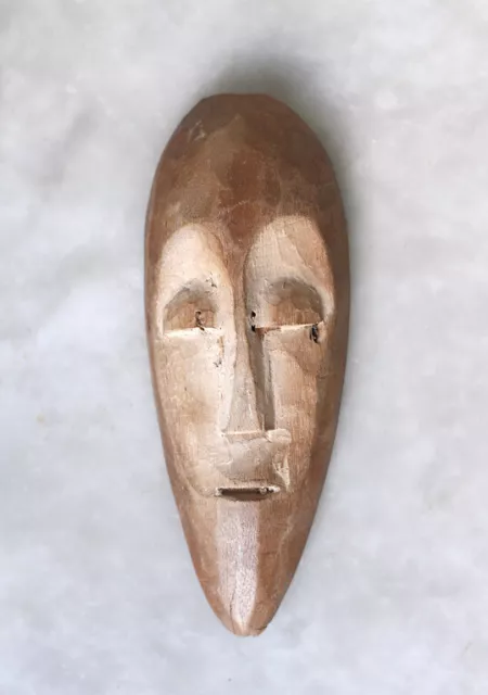 Antique Lega passport mask, Congo