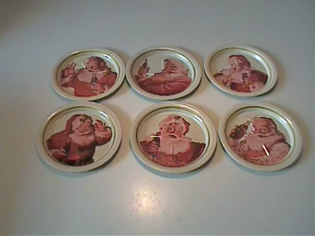 Six Vintage Metal Tin Coca Cola Santa Claus Coasters
