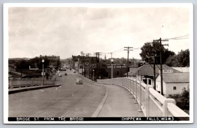 Chippewa Falls~Bridge~Hide & Fur Co~Cities Service Oil~Hotel Northern~RPPC 1940s