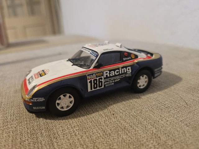 Miniature Spark 1/43 - Porsche 953 Rothmans #176 - Vainqueur Paris-Dakar 1984 (Metge/Lemoyne)