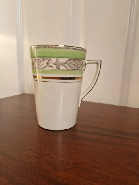 https://www.picclickimg.com/qA8AAOSw6ZhlCU56/Vintage-TAMSWARE-coffee-Cup-Mug-Melton-2249.webp