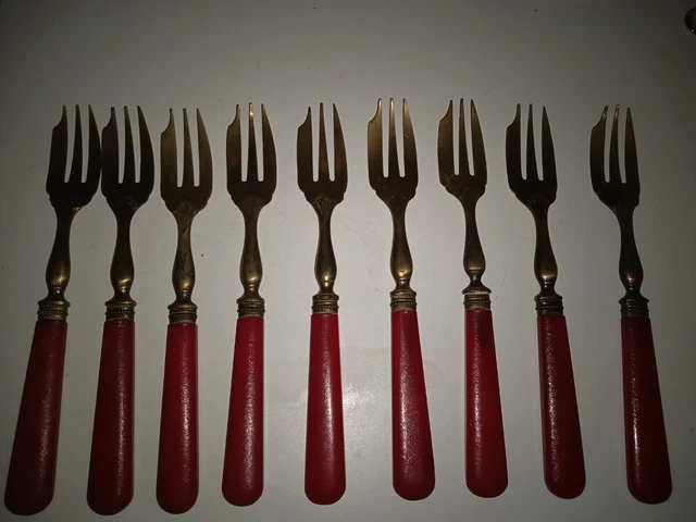 9 fourchettes à trois dents courbes en argent modèle coquill