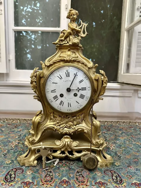 Working 19th. Century Antique Gilded Bronze French Clock Cupid Cherub, Serviced