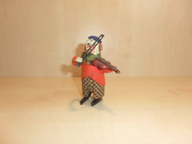 13436) Schuco - Tanzfigur Clown mit Geige - rot - 50iger - H. 11 cm - ansehen