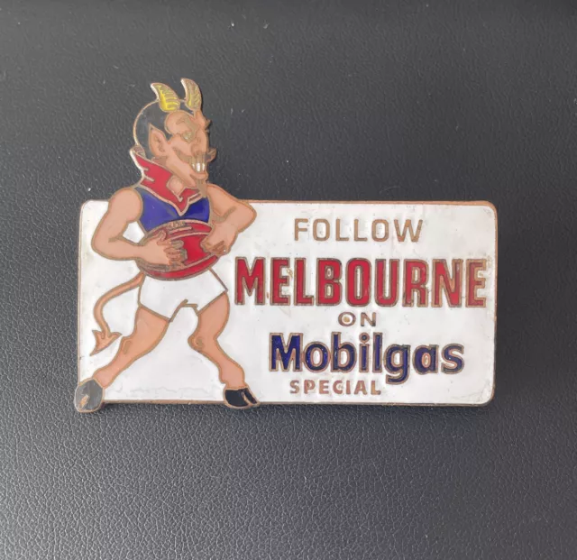 Vintage Follow Melbourne Demons Mobilgas Special VFL AFL Enamel Badge.