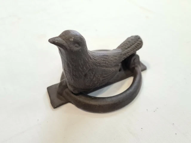 Heurtoir de porte d'entrée avec un oiseau en fonte