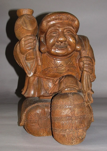A heavy, Rare/Fine Japanese Wood Carved Happy Man with a Signature-19th C