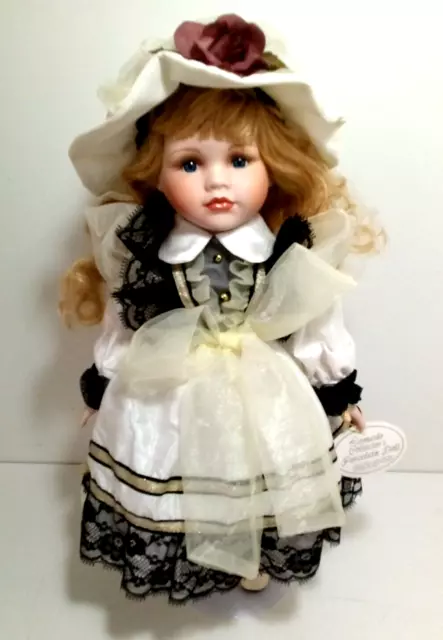 The Leonardo Collection Porcelain Doll Hayley 16" on Stand with Tag.