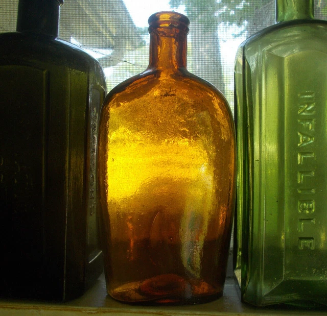 1870s APPLIED LIP L G CO (LYNDEBOROUGH,NH GLASS CO) AMBER PINT WHISKEY FLASK 1870s APPLIED LIP L G CO (LYNDEBOROUGH,NH GLASS CO) AMBER PINT WHISKEY FLASK