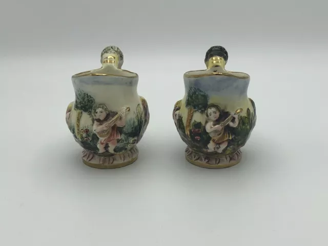 Capodimonte Monkey Boy Bird Crane Figural Porcelain Creamer Pair