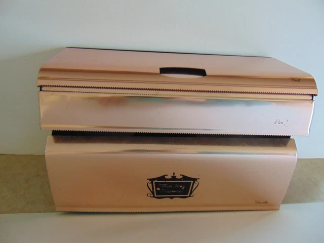 Metal 3 way dispenser foil, wax paper, paper towels hanging or free standing
