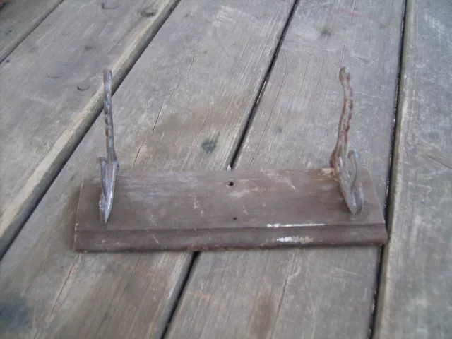 Vintage cast iron coat/hat hangers.  ⭐⭐⭐