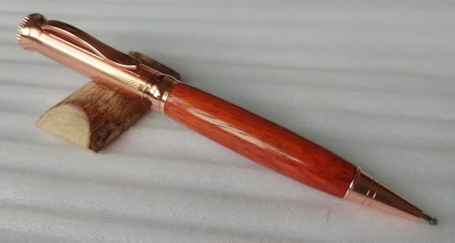 Hand Turned Twist Ball Pen Padauk Wood Blank. Rose detail Ideal gift.
