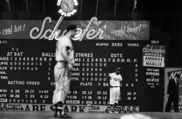 Brooklyn Dodgers Jackie Robinson on base during game vs Milwaukee - Old Photo 1