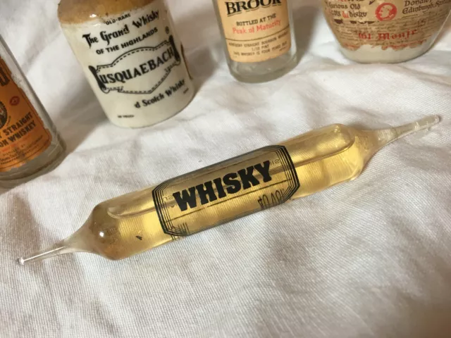 6 + 1  différentes mignonnettes anciennes de Whisky 2