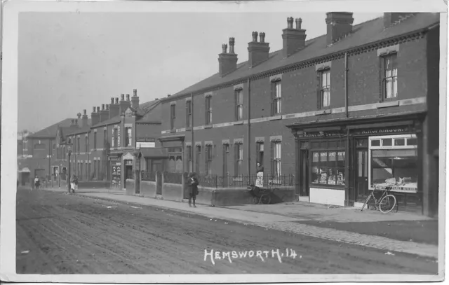 Hemsworth RP Postcard - Main street real photo with shops Butcher posted 1915