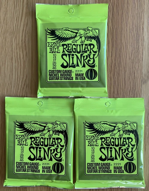 Ernie Ball 2221 Guitar Strings Regular Slinky New. 3 Sets
