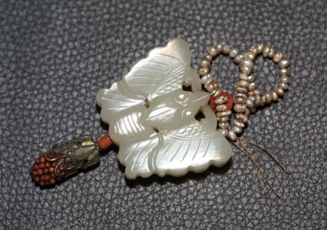 Antique Chinese carved white jade butterfly bead, Qing Dynasty, 19th century.