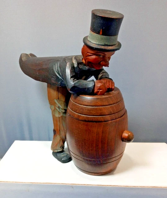 Vintage drunk leaning on wooden barrel hand carved figure  smoking cigar