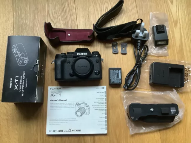 Fujifilm X-T1 16.3 MP Camera body, Vertical Battery Grip and flash