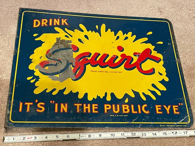 Drink squirt 1942 FLANGE IN THE PUBLIS EYE SQUIRT Co SCOTIO SIGN KENTON OH ADV