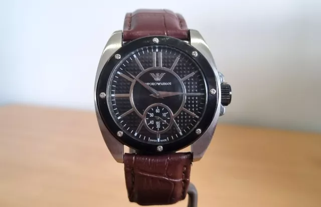 Emporio Armani SS case black dial quartz watch brown leather strap.