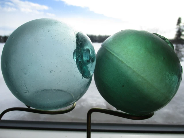 Two Authentic Beachcombed Japanese Glass Fishing Floats With Water Inside