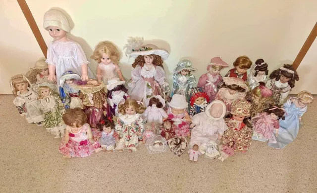 Doll Collection (33) porcelain / hard plastic / soft plastic / some with Stands.
