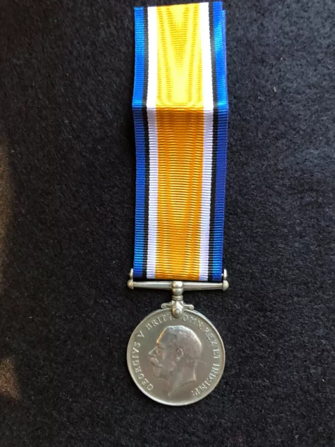 Original Silver WW 1 War Medal. Name neatly erased. with replacement ribbon