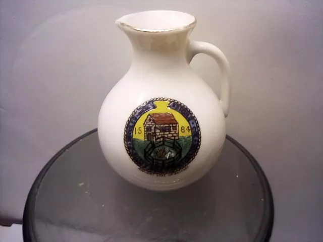 Eccles crested china Jug Goss