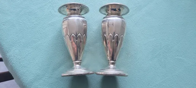 A pair of silver vases approx 198 grams with loaded bases