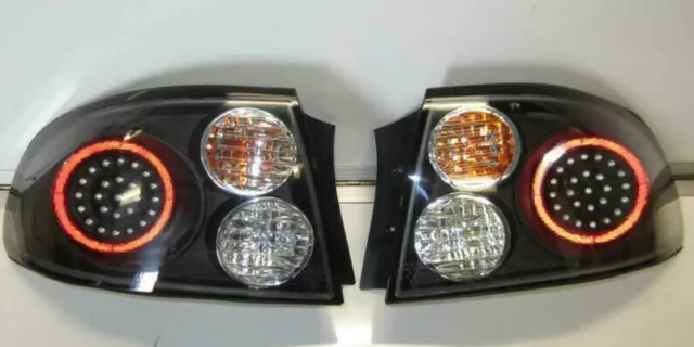 Vt commodore tail lights deals
