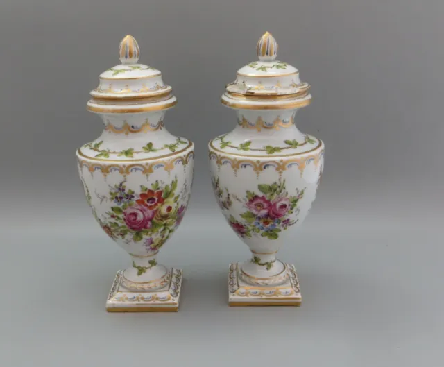 A Pair of Continental Porcelain Hand Painted Vases/Urns with Covers - French?