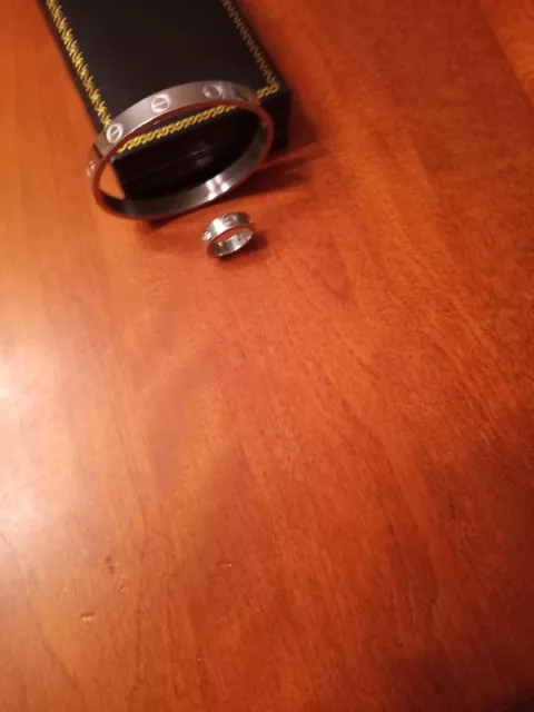 Silvertone bracelet and ring set