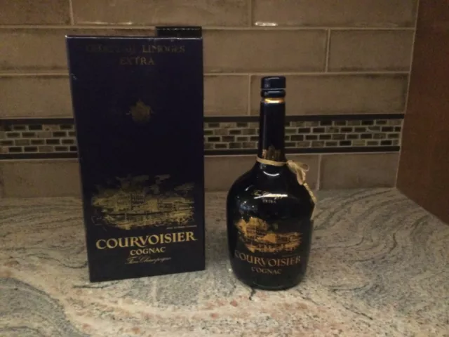 Botella de coñac vacía Chateau Limoges extra Courvoisier en caja forrada de satén