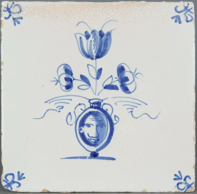 Nice Dutch Delft Blue tile, flowerpot with mask, begin 18th. century.