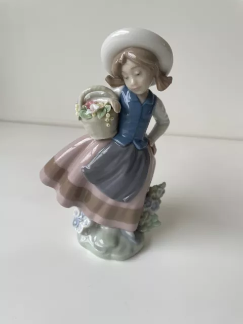 Lladro collectible figurine (retired)  Sweet Scent Girl 5221