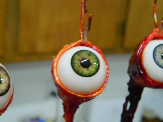 HALLOWEEN HORROR PROP Green RIPPED OUT EYEBALL hook Ornament Santa's Watching