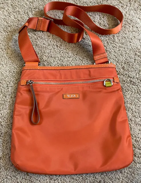 Tumi Orange Nylon Lined Adjustable Strap Zip Top Crossbody Bag Multiple Pockets