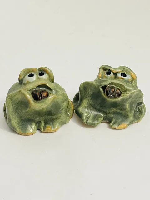 Green Ceramic Frogs With Coffee Beans In Their Mouths