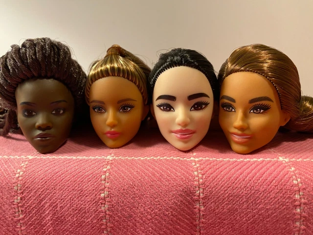 Lot of 4 Barbie doll heads