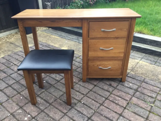 Solid Oak Dressing Table/Office desk, matching black vinyl covered piano stool.