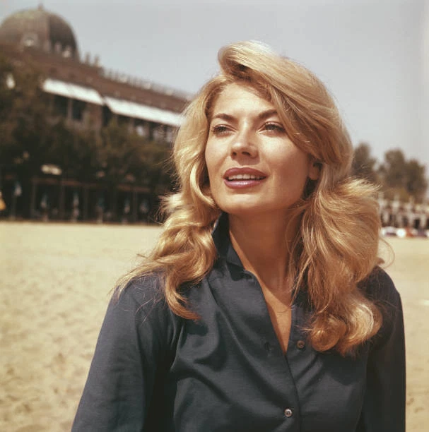 AMERICAN ACTRESS NADIA Sanders posed on a beach during the 196 1960s