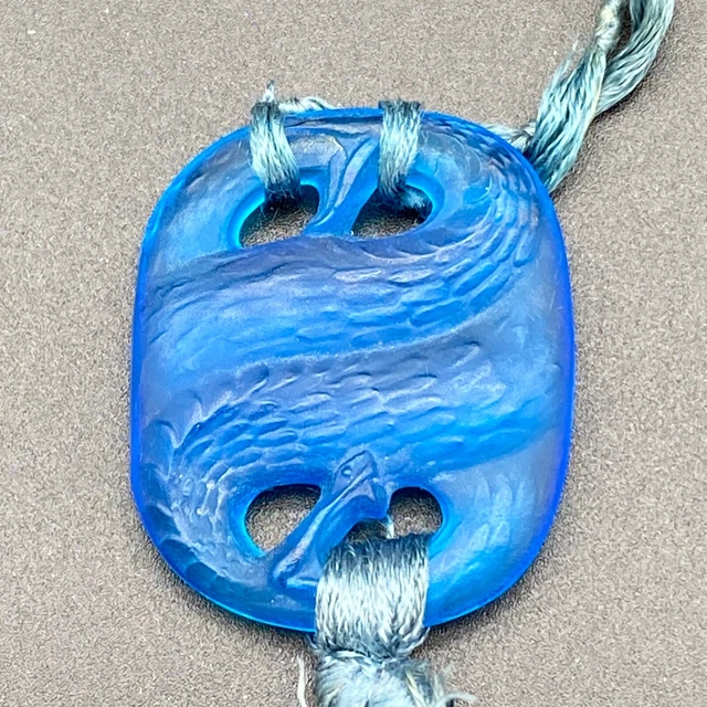 A Blue Glass Snake Pendant by R.Lalique.