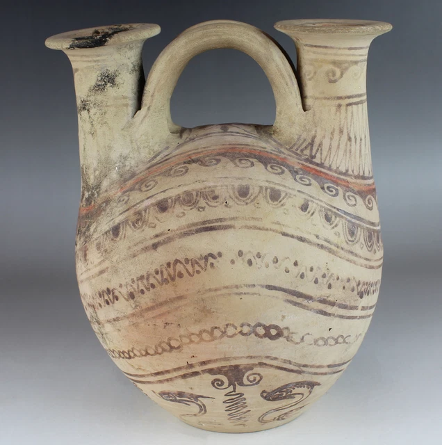 Greek double spouted askos with dolphins daunian