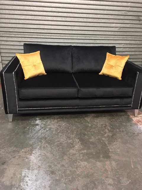 Black sofa on sale with silver studs
