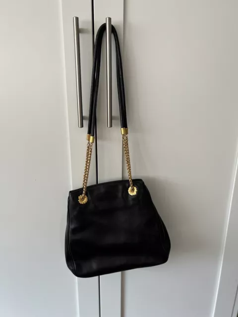 Escada black lambskin  purse w/thick double gold chains. Shoulder/Crossbody Bag