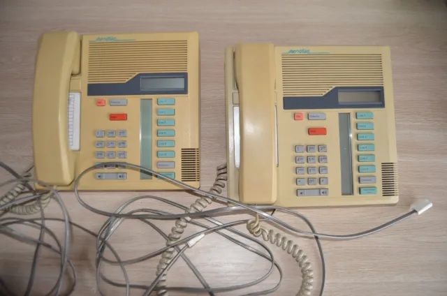 2 Norstar Meridian office telephones M7208. CREAM colour a little discoloured.