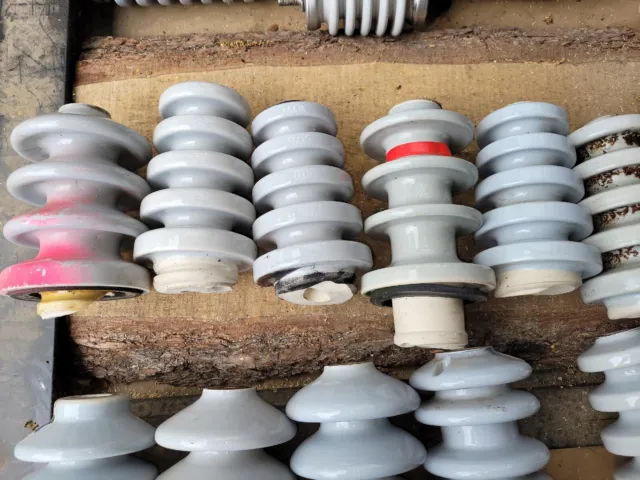 Large Supply of Porcelain  High Voltage Electrical Insulators / Bushings.