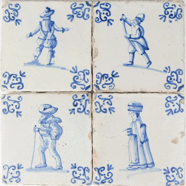 Nice set of 4 Dutch Delft Blue tiles, figures including a skater, 17th. century.